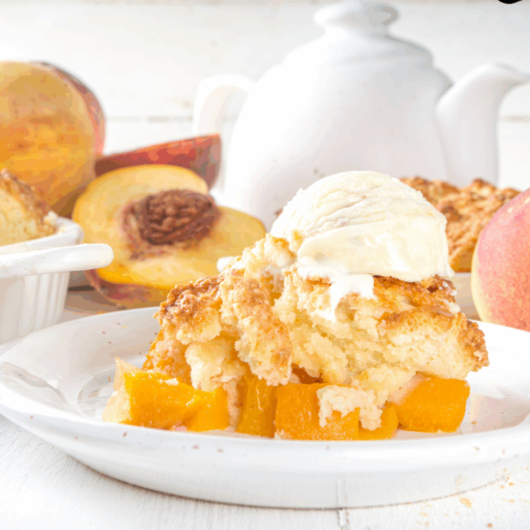 Plate of Longhorn Steakhouse Grilled Peach Cobbler Recipe on kitchen table.