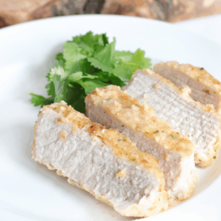 Shake ‘N Bake style pork chops in the Ninja Foodi, golden and crispy, ready to serve.