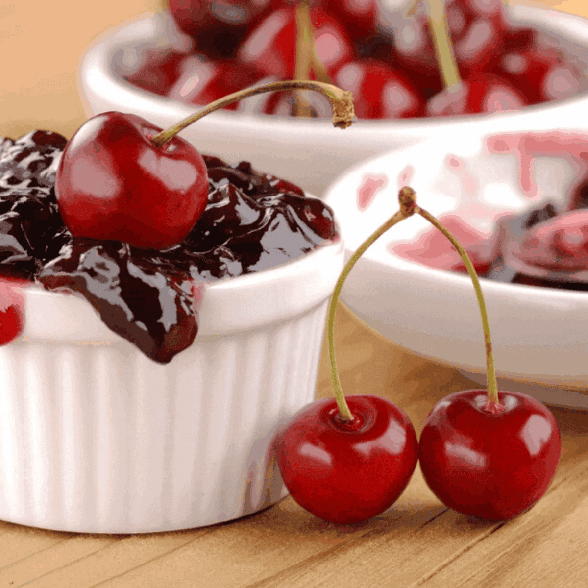Bowl of homemade Instant Pot cherry jam with a spoon