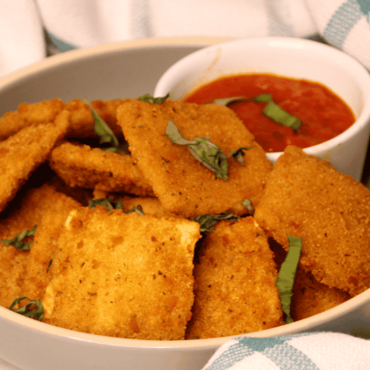 Crispy golden Fazoli’s-style toasted ravioli served with marinara dipping sauce