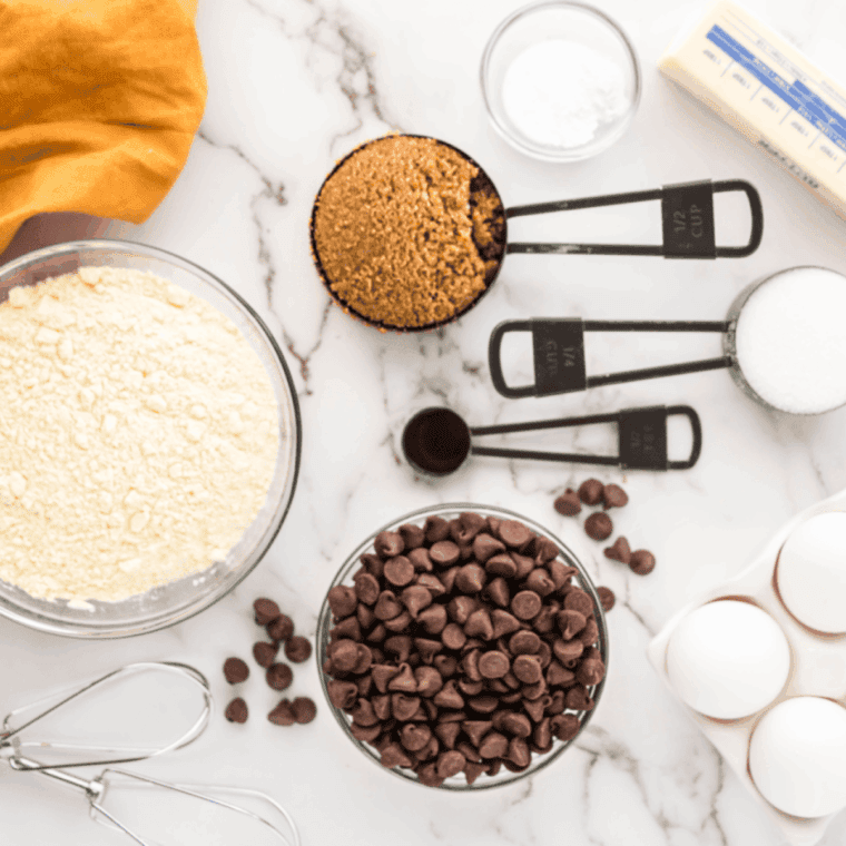 Ingredients needed for Air Fryer Chocolate Muffins on kitchen table.