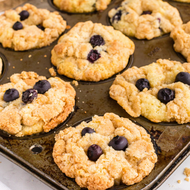 Air fryer Starbucks blueberry streusel muffins cooling on a wire rack