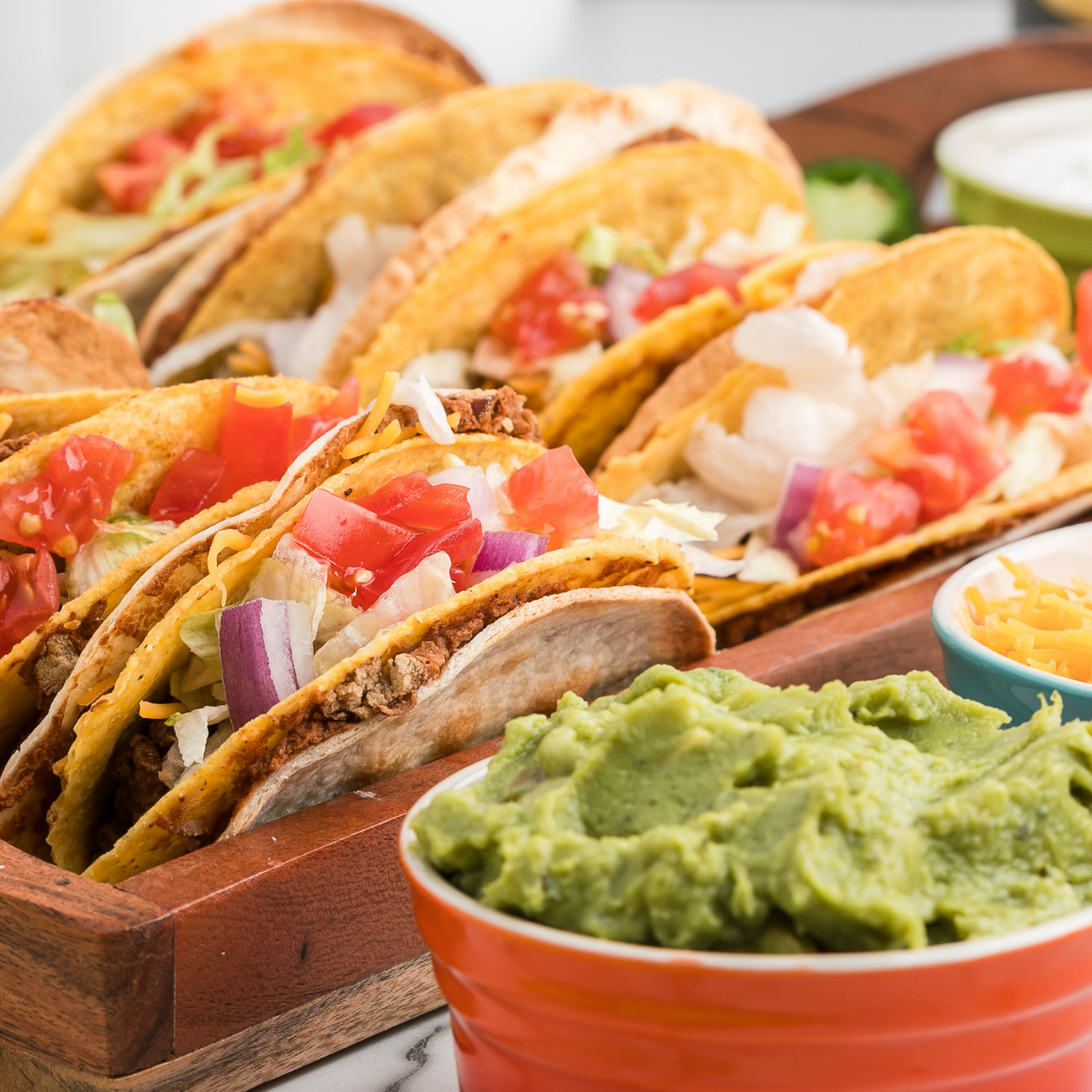 Sliced steak piled into warm tortillas and finished with taco toppings