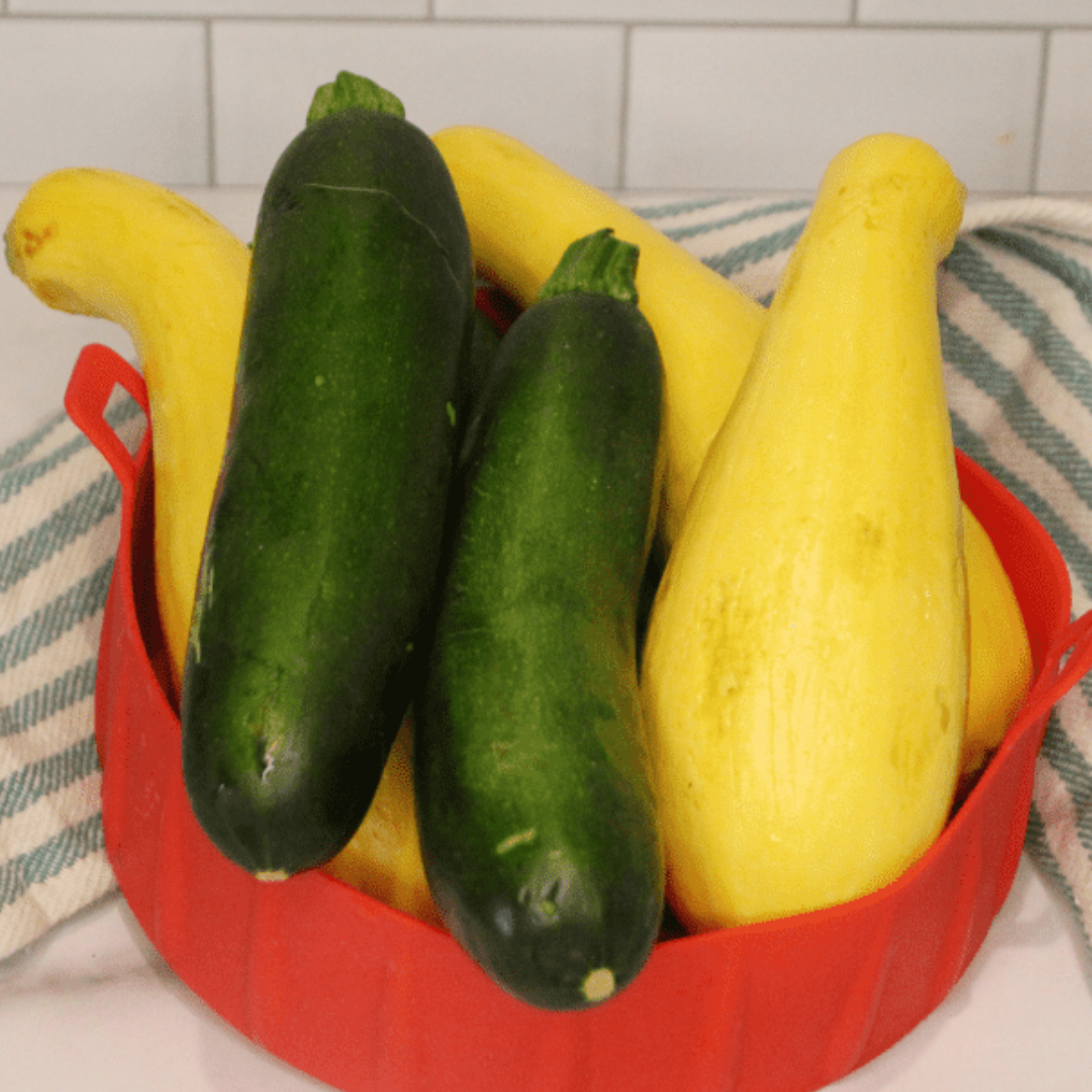 Ingredients needed for Crispy Air Fryer Yellow Squash and Zucchini (No Soggy) on kitchen table.