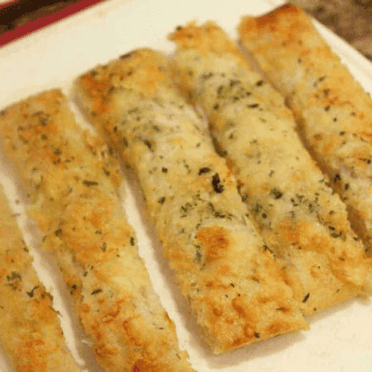 golden brown cheesy bread sticks fresh from the air fryer