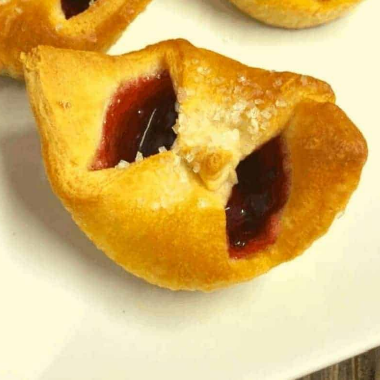 Air fryer cherry pastry with golden flaky crust and cherry filling inside