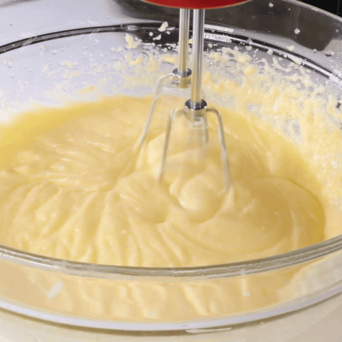 Mixing dry ingredients and wet ingredients separately to prepare the batter for homemade copycat Trader Joe’s pancake bread.