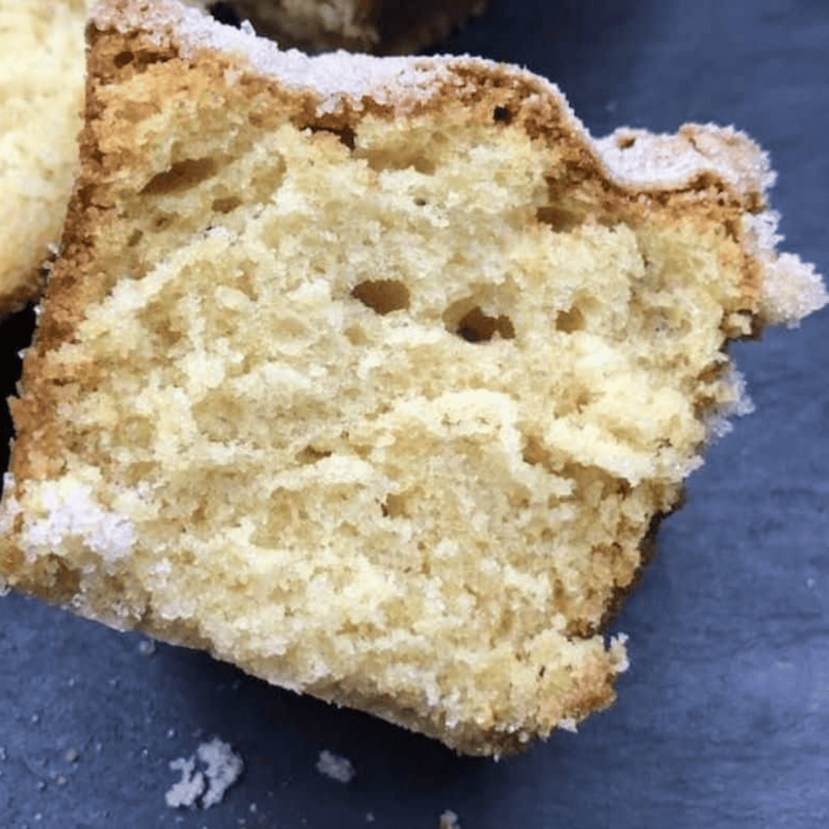 Homemade copycat Trader Joe’s Pancake Bread sliced on a cutting board with a cinnamon-streusel topping.