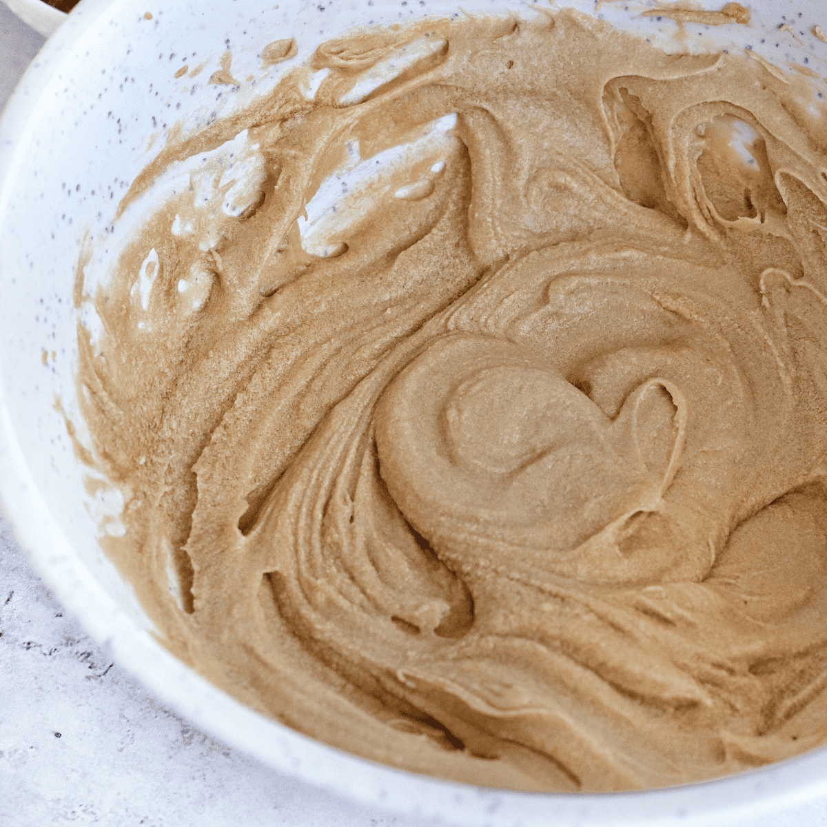 Creamed butter and sugar in a mixing bowl.