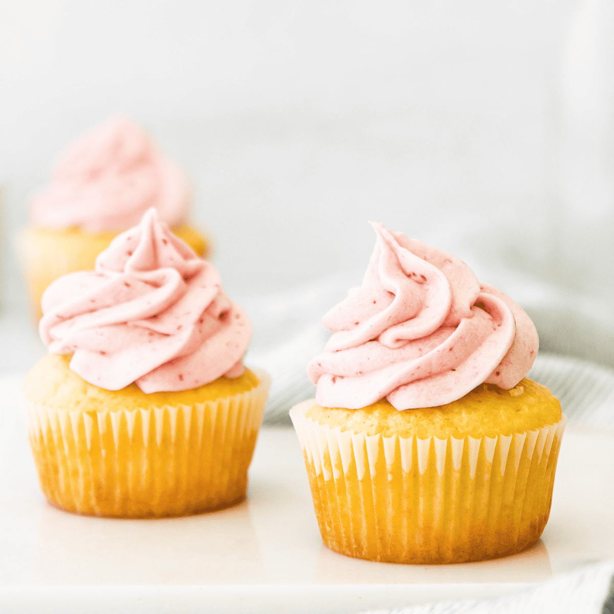 Display of soft, moist, air fryer cupcakes ready to eat.