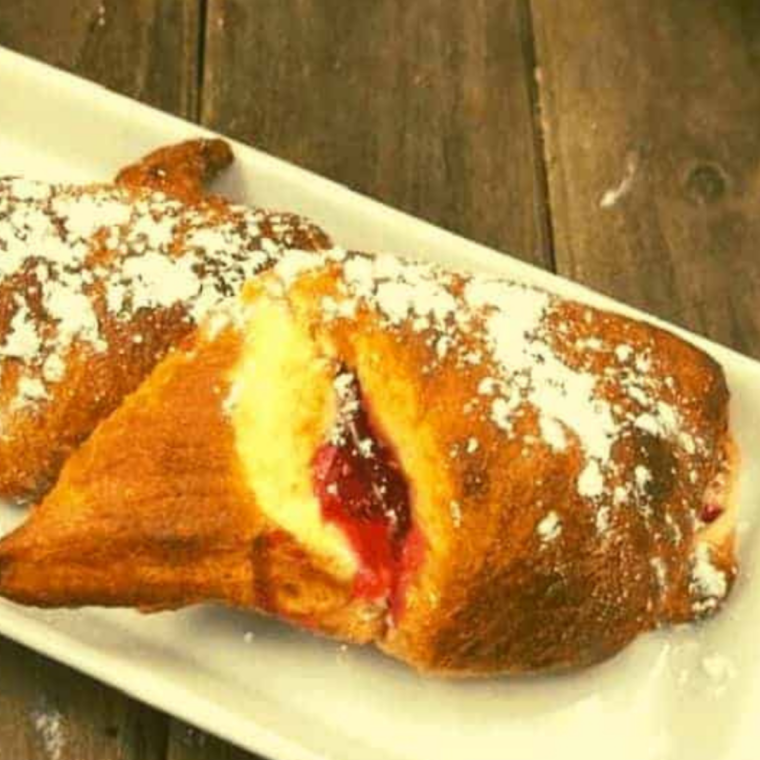 Golden, flaky crescent rolls filled with sweet cherry pie filling, fresh from the air fryer.