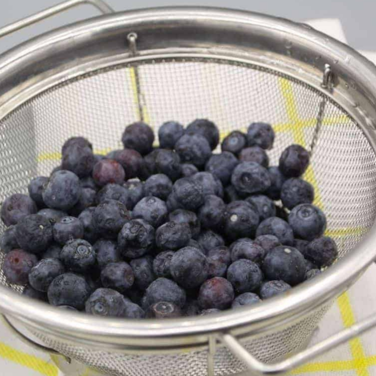 Bowl of fresh blueberries for making air fryer blueberry egg rolls