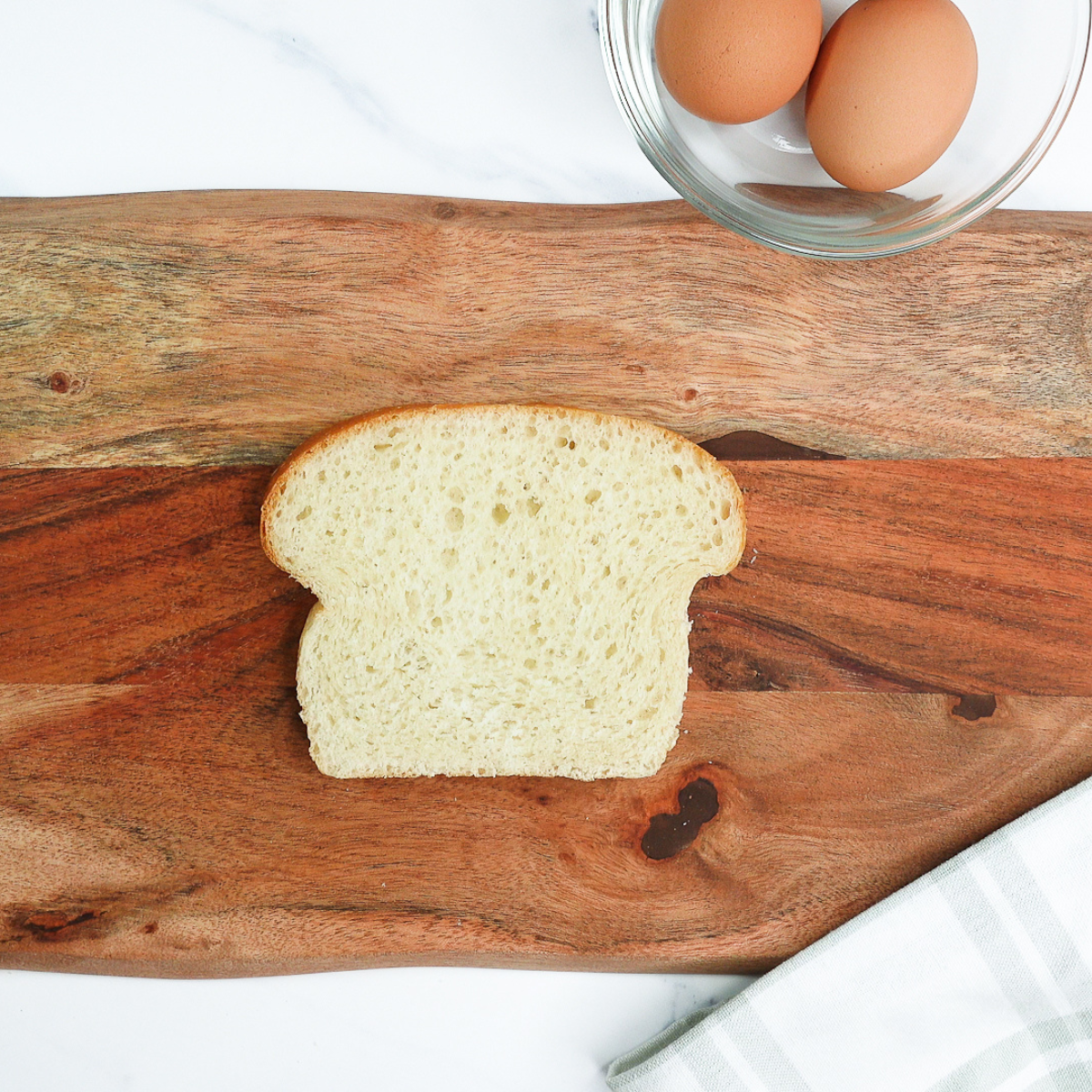Parchment paper round placed in the bottom of an air fryer basket