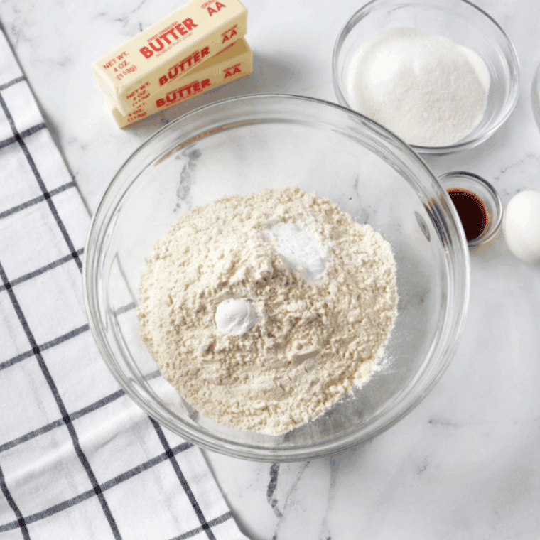 Ingredients needed for Air Fryer Lemon Poppy Seed Muffins on kitchen table.