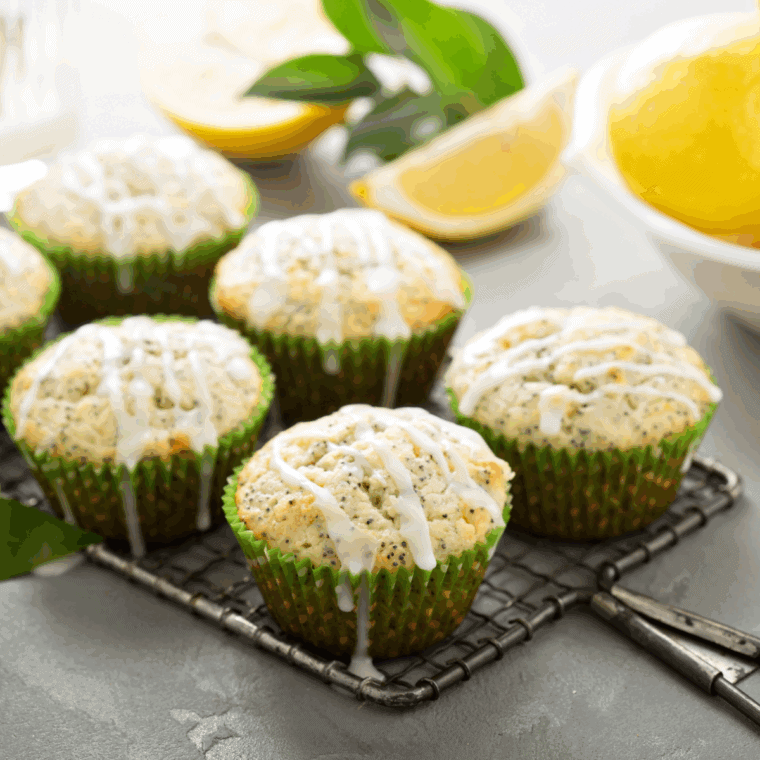 Golden air fryer lemon poppy seed muffins with zesty lemon and sprinkled poppy seeds