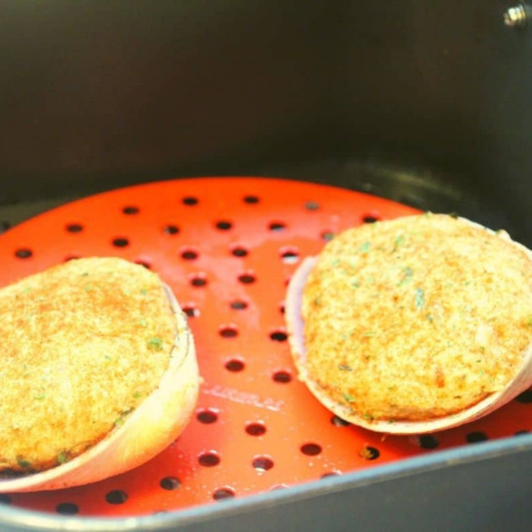 Frozen quahog stuffed clam in the air fryer basket ready to cook