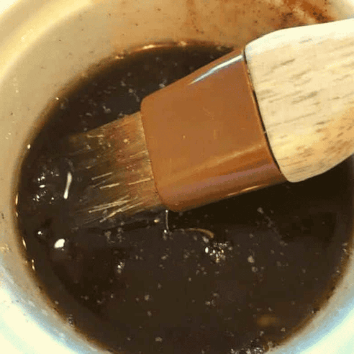 Small bowl with brown sugar, cinnamon, and cloves mixed together.