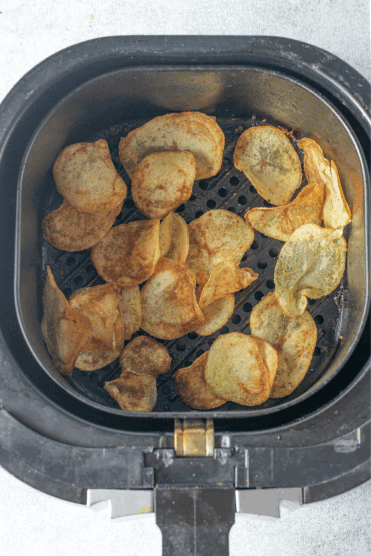 Cooked Easy Homemade Lay’s Potato Chips Recipe in the air fryer basket.