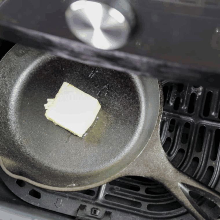 Melting butter in a skillet placed inside the air fryer at 400°F
