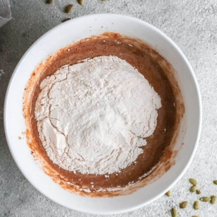 Flour and baking powder stirred into the batter until shiny