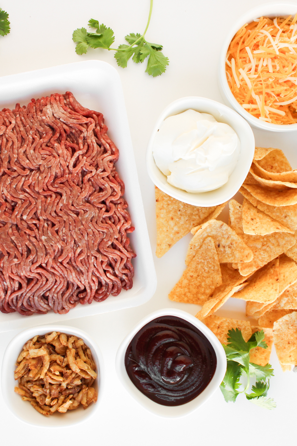 Ingredients needed for Air Fryer Copycat Taco Bell Nachos BellGrande on kitchen table.