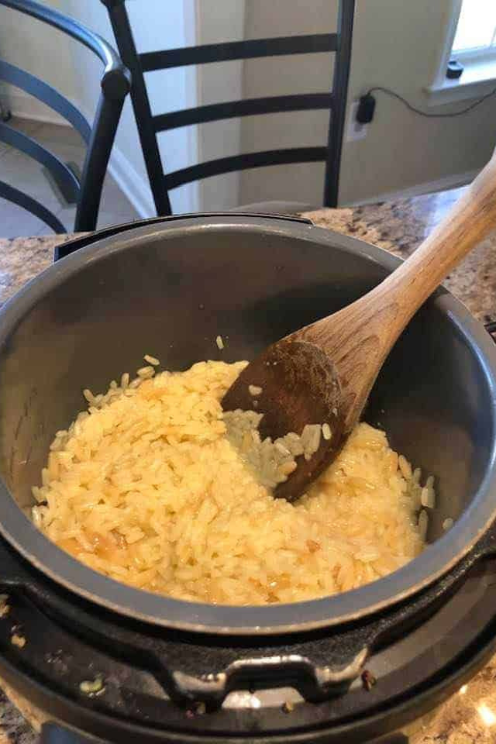 Instant Pot set to high pressure cooking rice pilaf