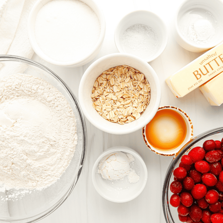 Ingredients needed for Air Fryer Cranberry Muffin For One on kitchen table.