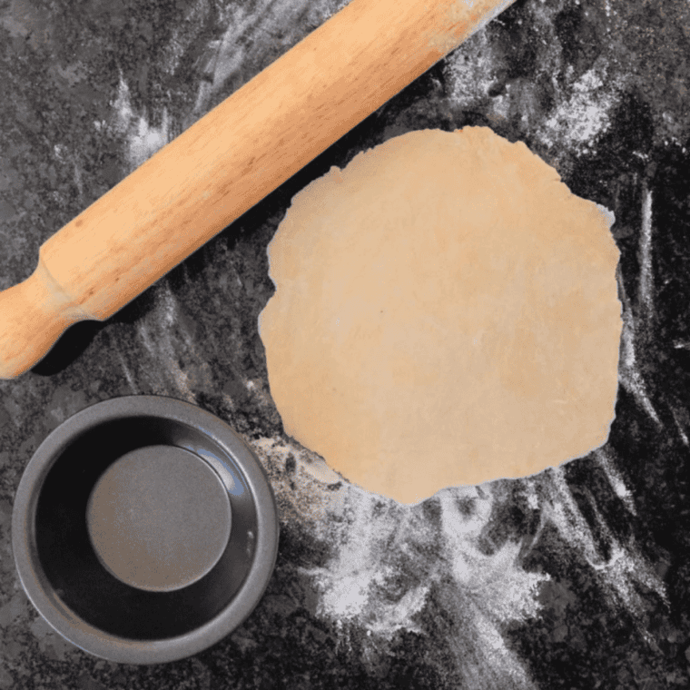 Pie dough mixed in a glass bowl for homemade air fryer pumpkin pie