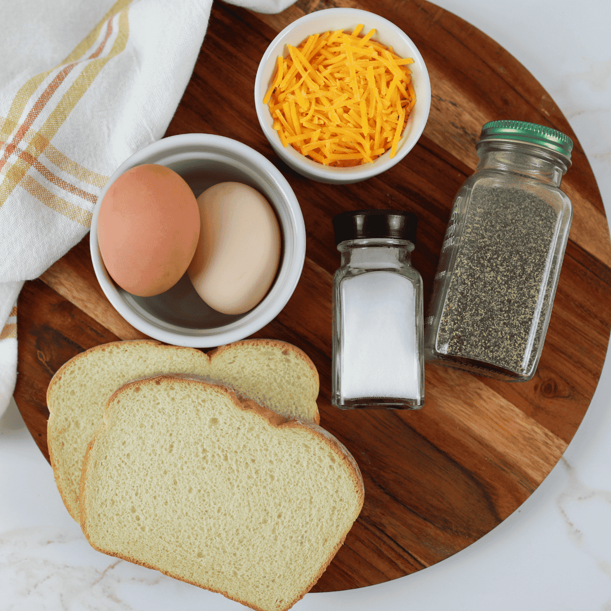 Ingredients needed for Easy Air Fryer Egg Toast on kitchen table.