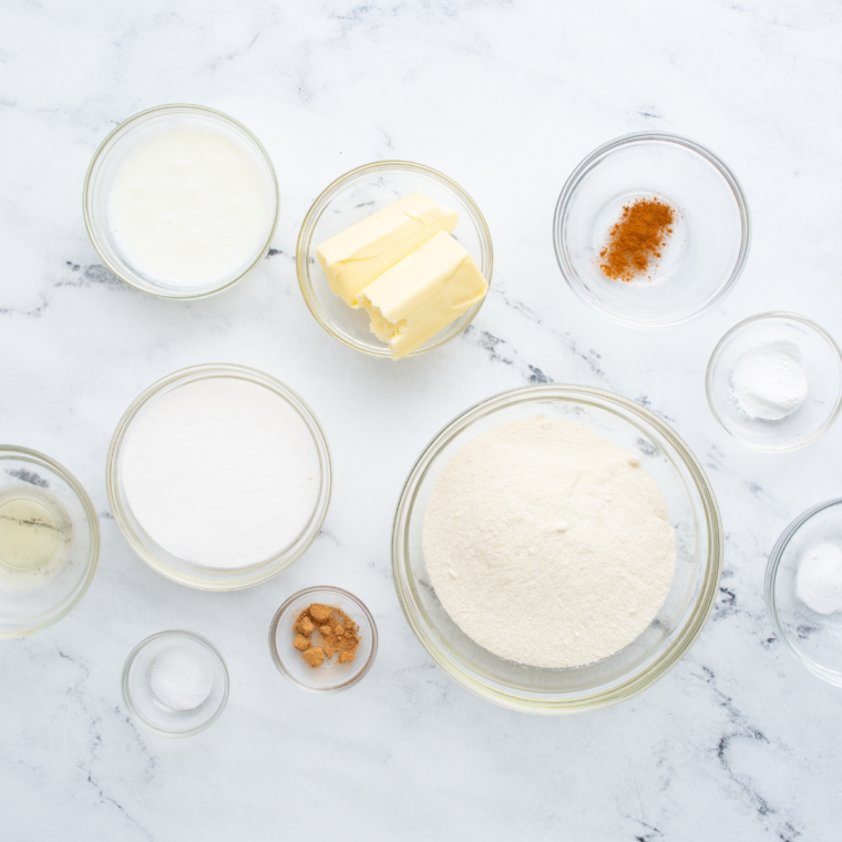 Flour, sugar, butter, and eggs measured out for 4 ingredient air fryer pound cake