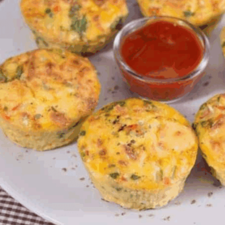 Plate of Starbucks Italian Sausage Egg Bites with dipping sauce.