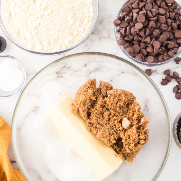 Creamed butter and sugar in a mixing bowl for cookie pizza dough