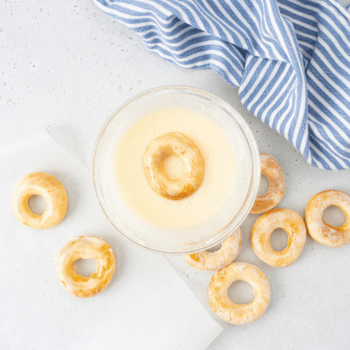 Homemade copycat Dunkin Donuts glazed donuts fresh and golden.