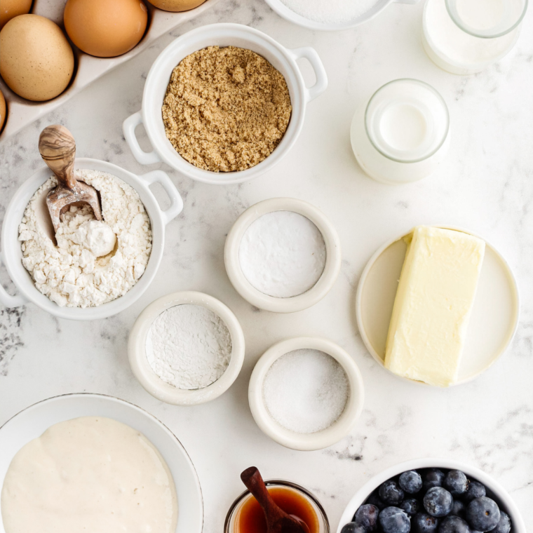 Ingredients for air fryer blueberry bread measured into bowls
