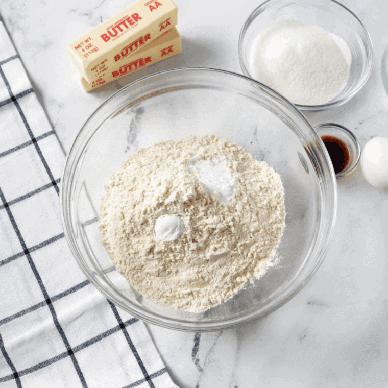 Ingredients needed for Air Fryer Cinnamon Sugar Muffins on kitchen table.