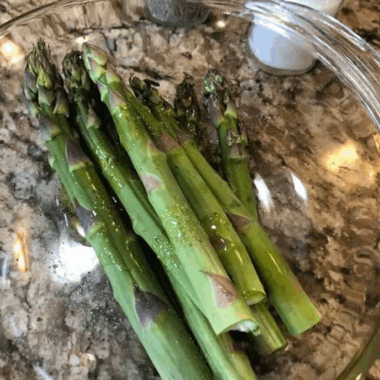 Rinsed asparagus spears trimmed and patted dry with paper towel.