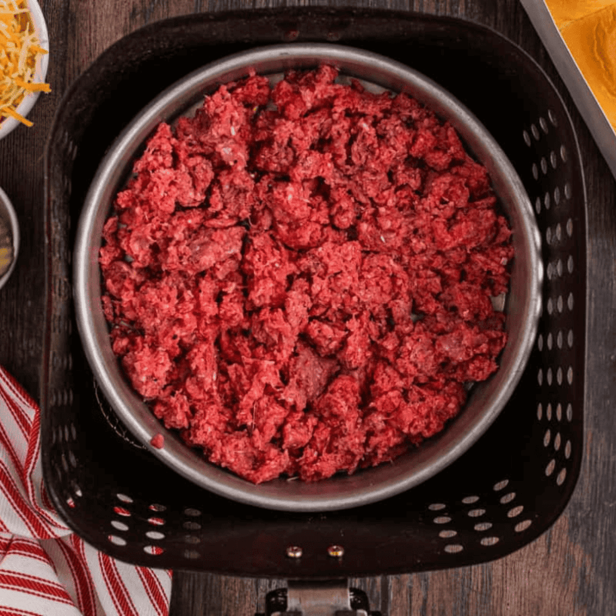 Ingredients needed for Easy Air Fryer Ground Beef Tacos on kitchen table.