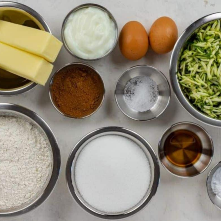 Ingredients for air fryer zucchini bread arranged on a counter