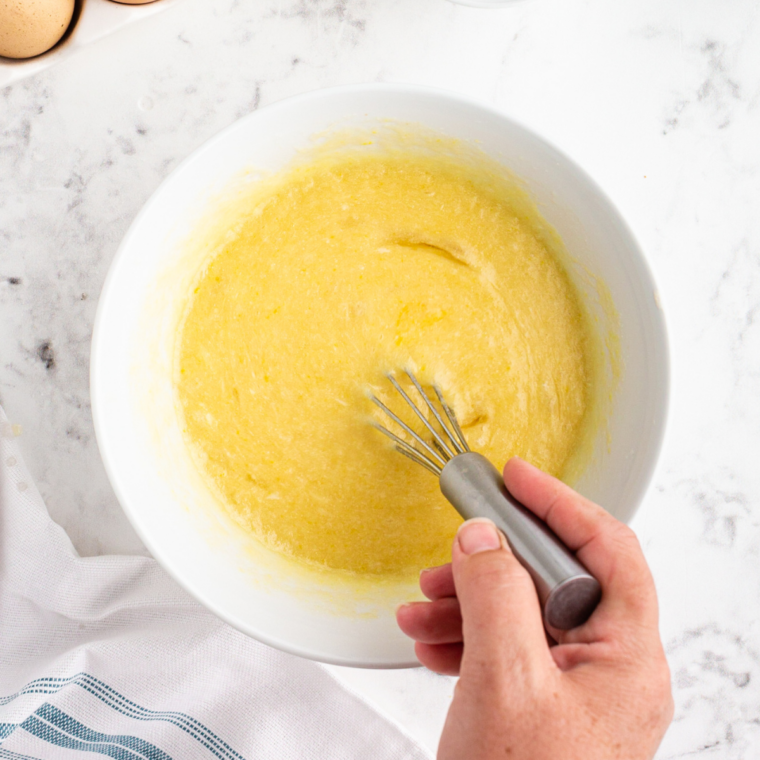 Eggs, oil, sugar, and vanilla whisked smooth in a second bowl
