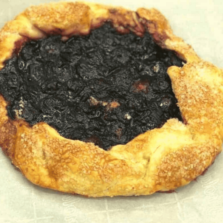 Rustic air fryer blueberry galette with golden crust and sweet blueberry filling