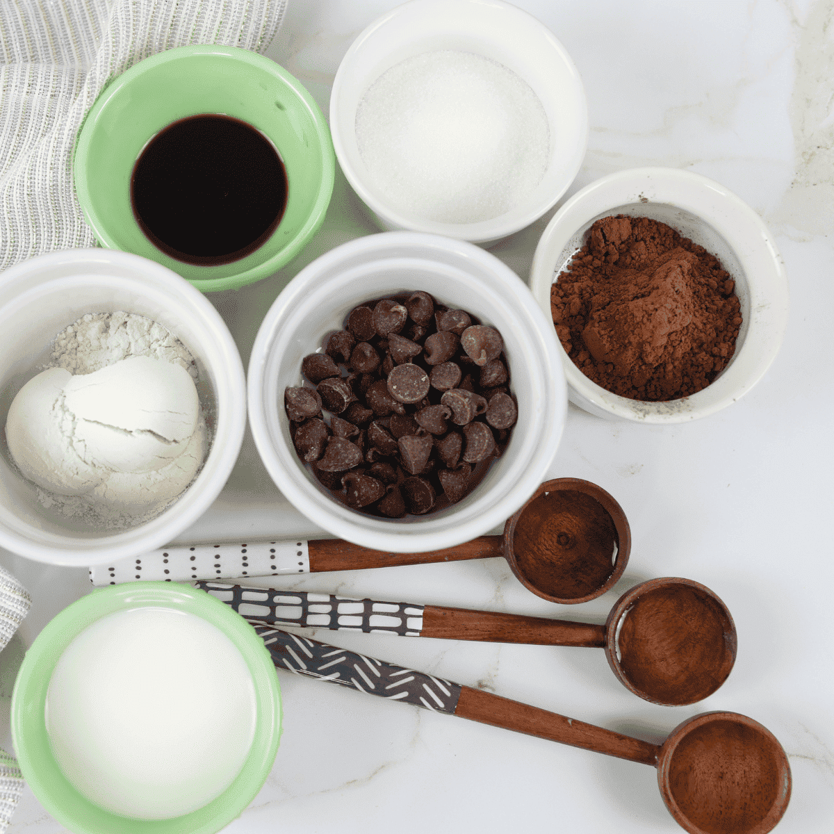 Ingredients needed for Air Fryer Brownie in a Mug on kitchen table.