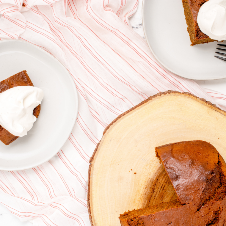 Homemade air fryer pumpkin cake topped with cream cheese frosting