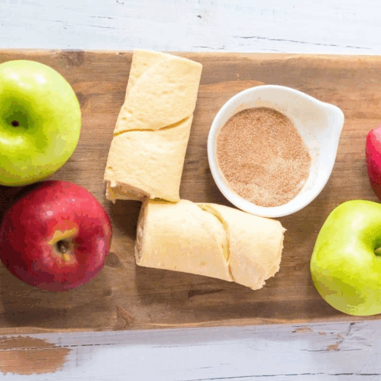 Ingredients needed for Air Fryer Mini Muffin Tin Apple Pies on kitchen table.