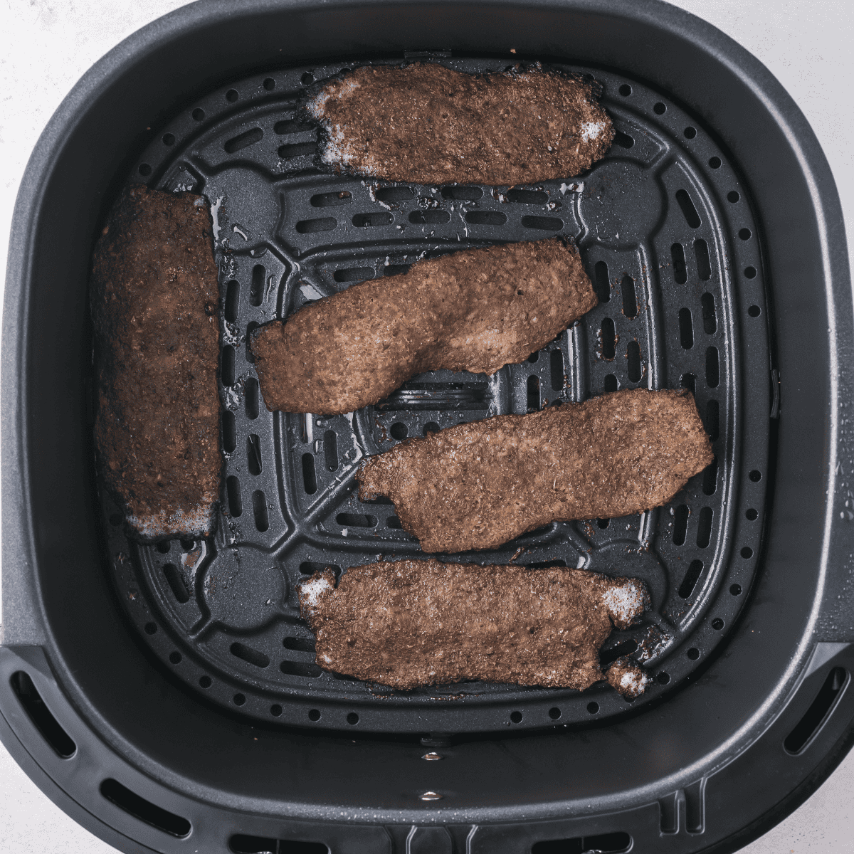 Finished air fryer beef gyro folded in pita and ready to serve