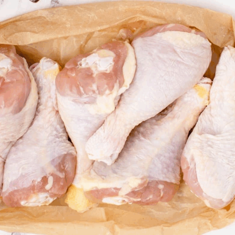 Ingredients needed for Easy Air Fryer Cajun Chicken Drumsticks on kitchen table.