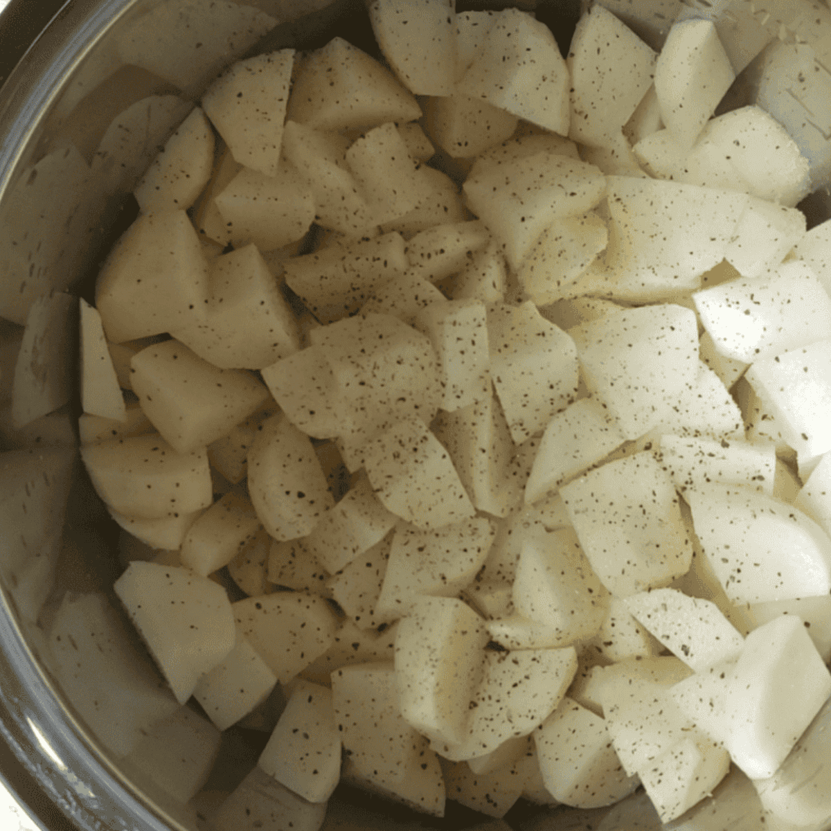 Closing Instant Pot lid and pressure cooking potatoes for 8 minutes
