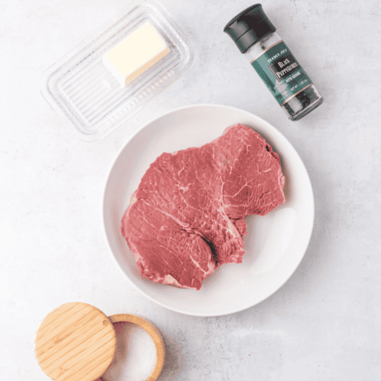 Ingredients needed for Perfect Air Fryer Sirloin Steak (Juicy & Tender!) on kitchen table.