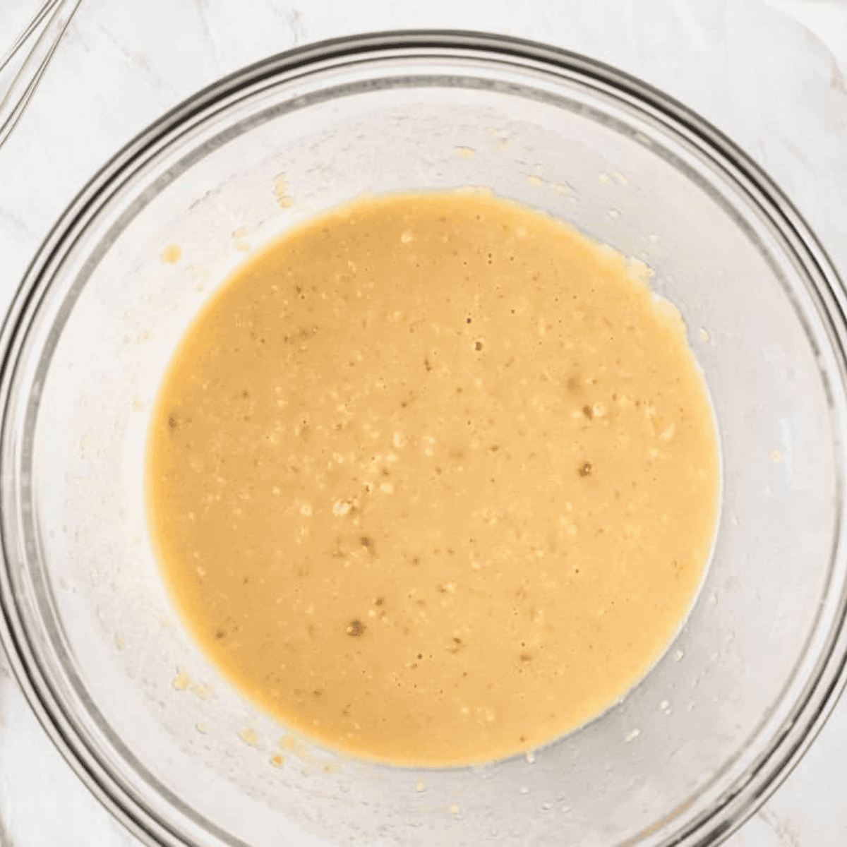 Stirring brown sugar and cinnamon together in a small bowl