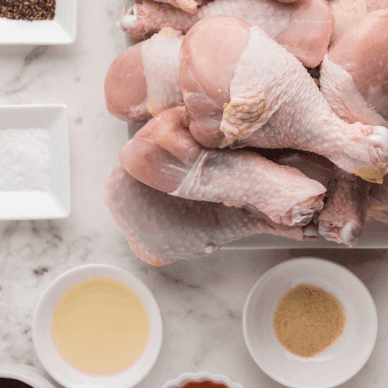 Ingredients needed for Easy Crispy Baked Lemon Pepper Chicken Drumsticks (Legs) on kitchen table.