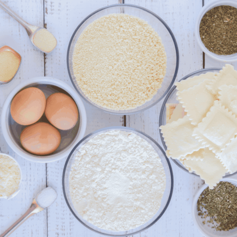 Ingredients needed for Easy Old Spaghetti Factory Toasted Ravioli on kitchen table.